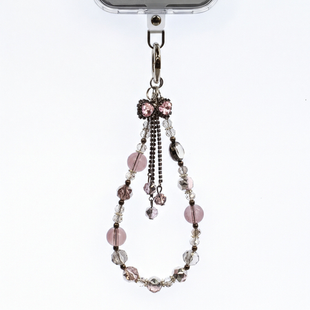 Crong Phone Charm Pink Bow – telefono dirželis ant riešo su dekoratyviniu kaspinu